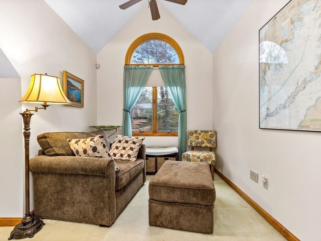 11 Wolf Road Bourne, MA 02532 - Photo 17 of 38 a living room with furniture and a large window