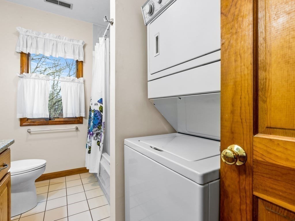 11 Wolf Road Bourne, MA 02532 - Photo 19 of 38 a view of bathroom with a sink and a mirror