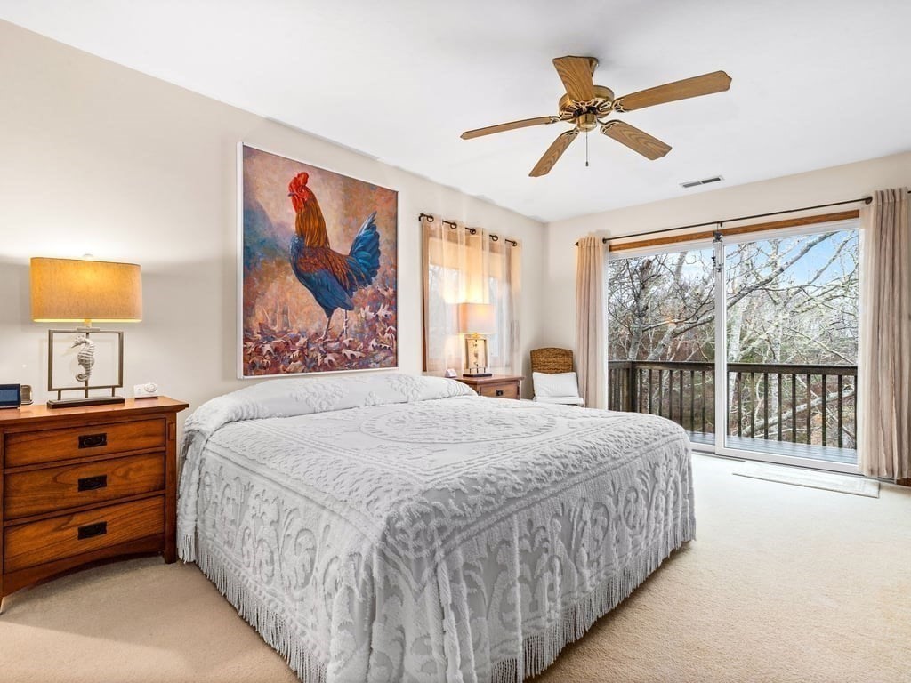 11 Wolf Road Bourne, MA 02532 - Photo 20 of 38 a bedroom with a bed dresser and a window