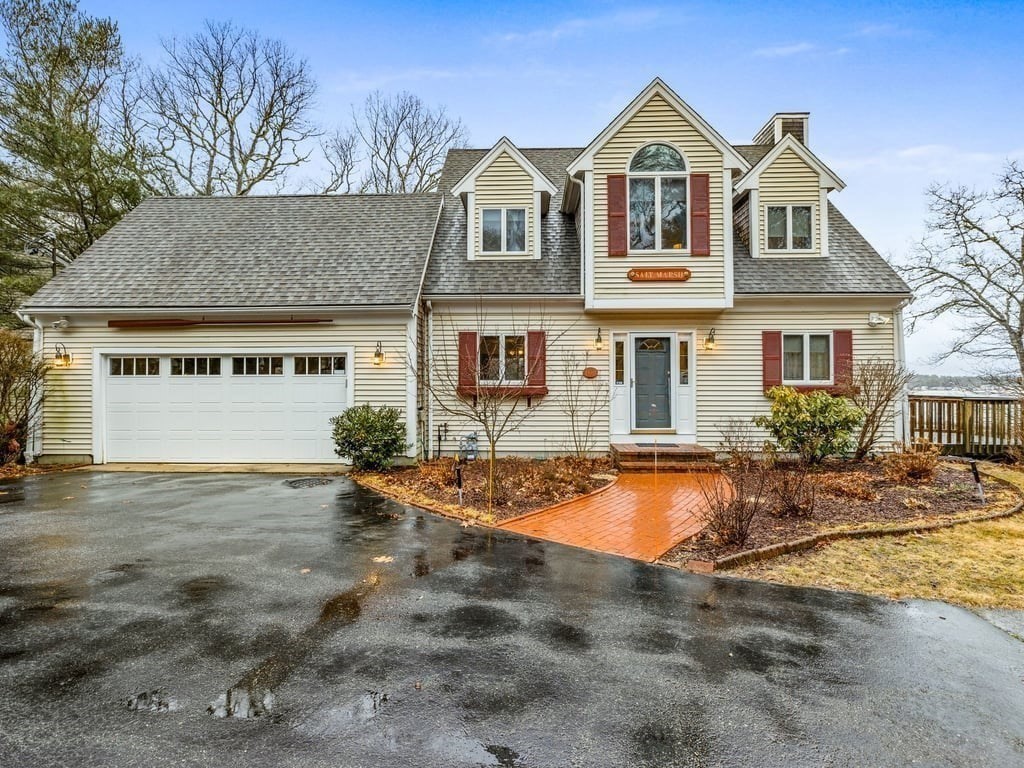 11 Wolf Road Bourne, MA 02532 - Photo 3 of 38 a front view of a house with a yard