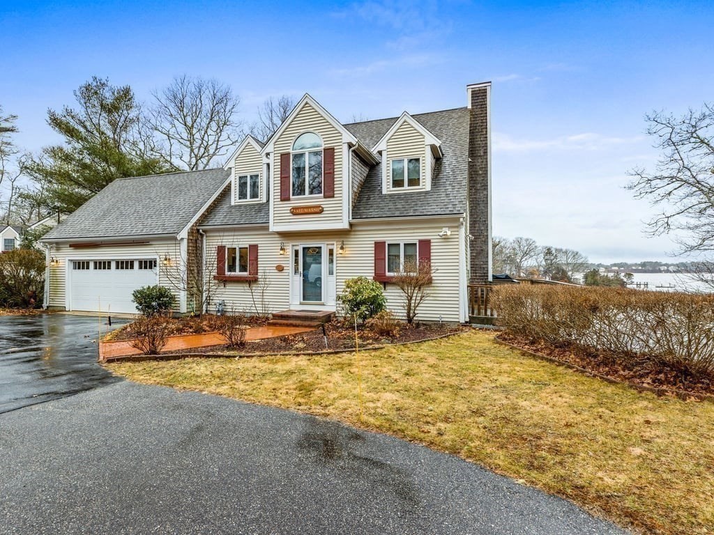11 Wolf Road Bourne, MA 02532 - Photo 32 of 38 a front view of a house with a yard