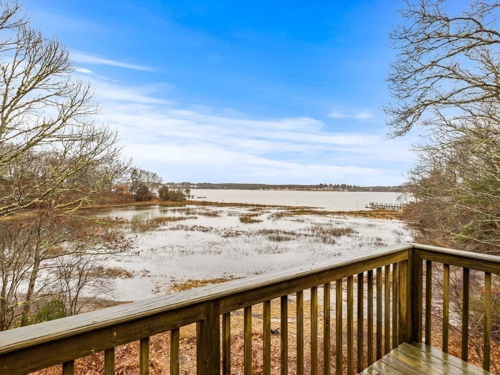 11 Wolf Road Bourne, MA 02532 - Photo 7 of 38 a view of ocean from a balcony