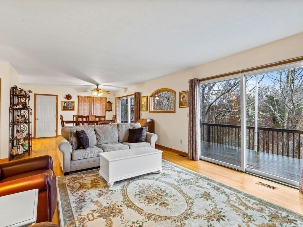 11 Wolf Road Bourne, MA 02532 - Photo 8 of 38 a living room with furniture and a large window