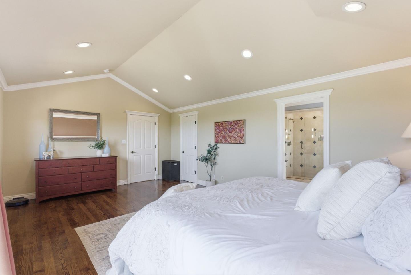 2884 Roland Avenue San Carlos, CA 94070 - Photo 18 of 27 a bedroom with a large bed and a couch