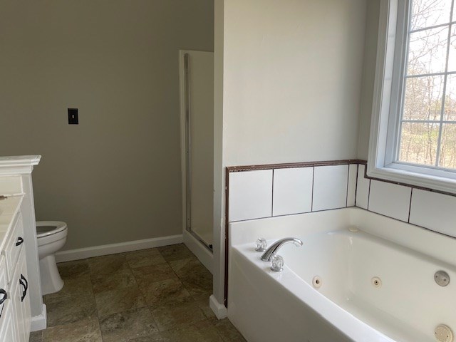 114 Nelson Ridge Drive Ball Ground, GA 30107 - Photo 9 of 15 Main bedroom en suite with tub and separate shower