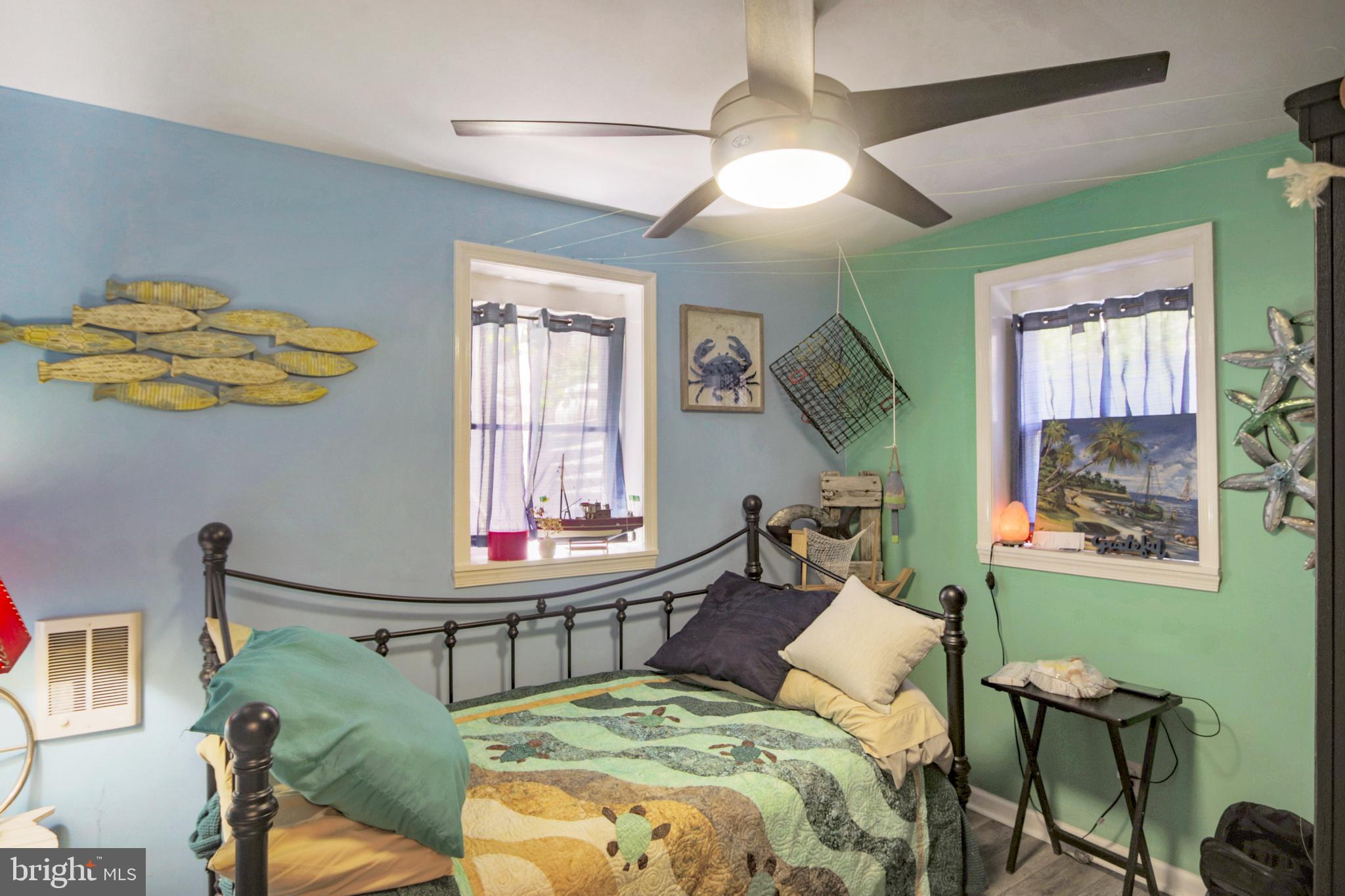 41 Wood Landing Road Fredericksburg, VA 22405 - Photo 17 of 79 a bedroom with a bed and a mirror