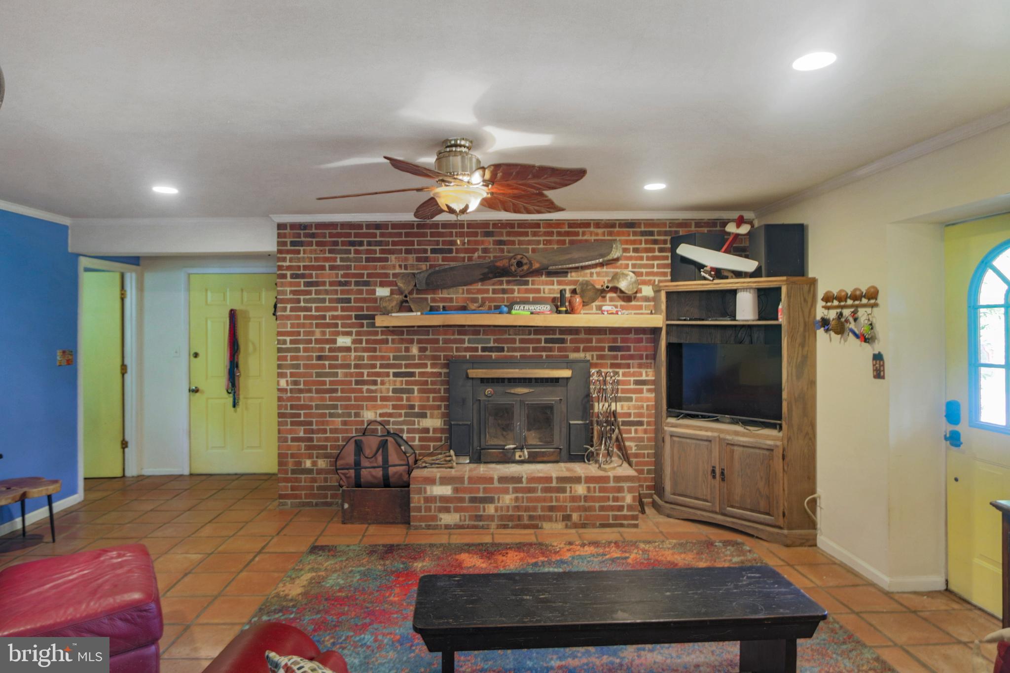 41 Wood Landing Road Fredericksburg, VA 22405 - Photo 26 of 79 a living room with furniture and a fireplace