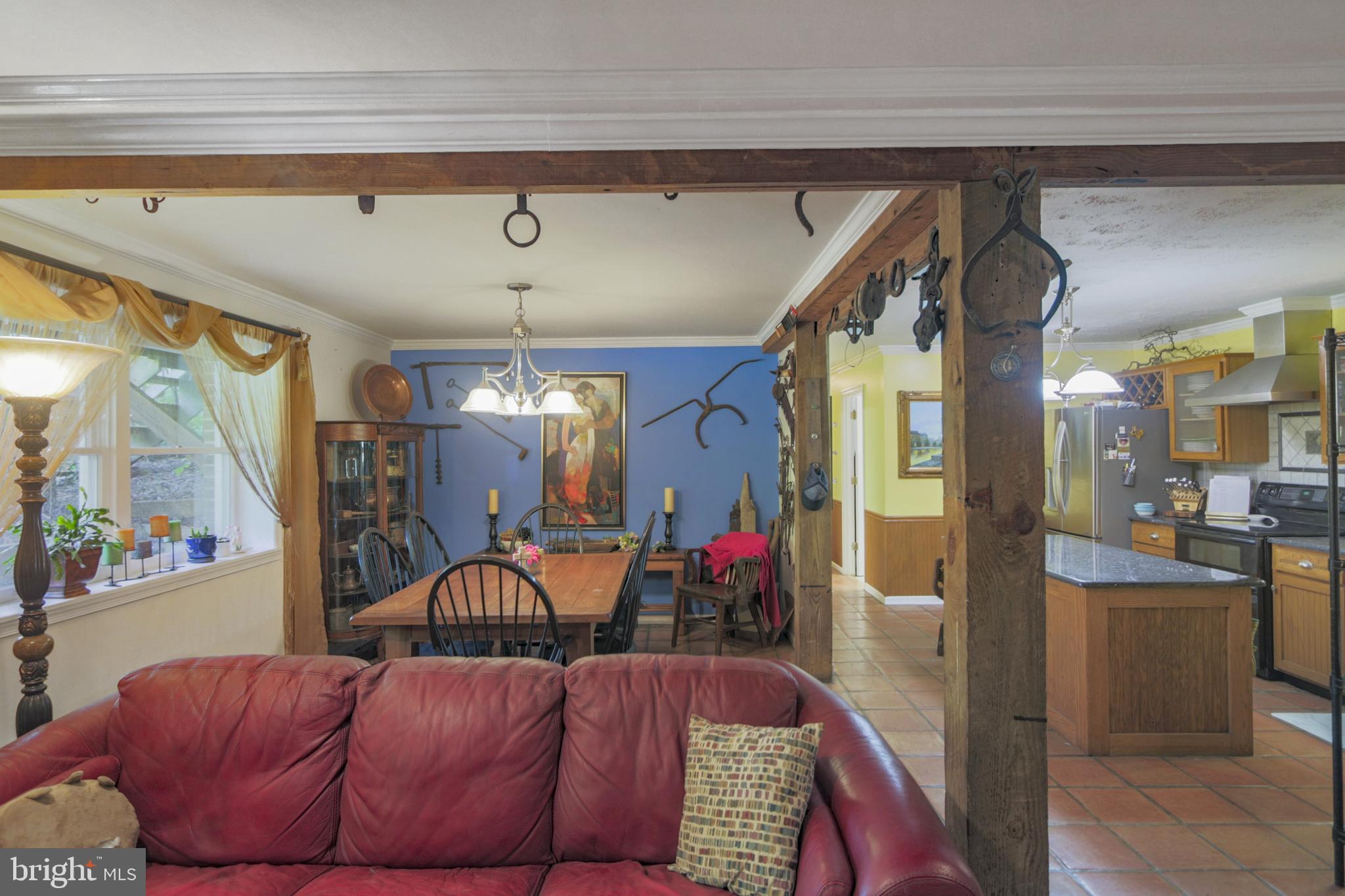 41 Wood Landing Road Fredericksburg, VA 22405 - Photo 29 of 79 a living room with furniture and a chandelier