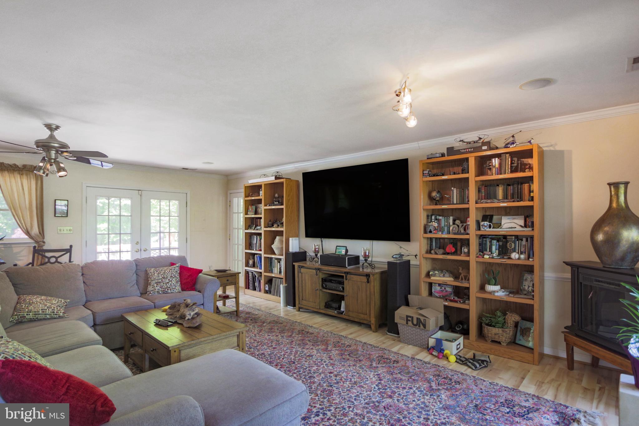 41 Wood Landing Road Fredericksburg, VA 22405 - Photo 37 of 79 a living room with furniture and a flat screen tv