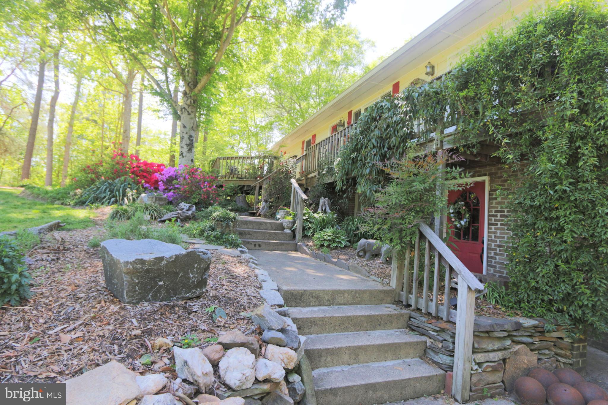 41 Wood Landing Road Fredericksburg, VA 22405 - Photo 5 of 79 a front view of a house with a yard