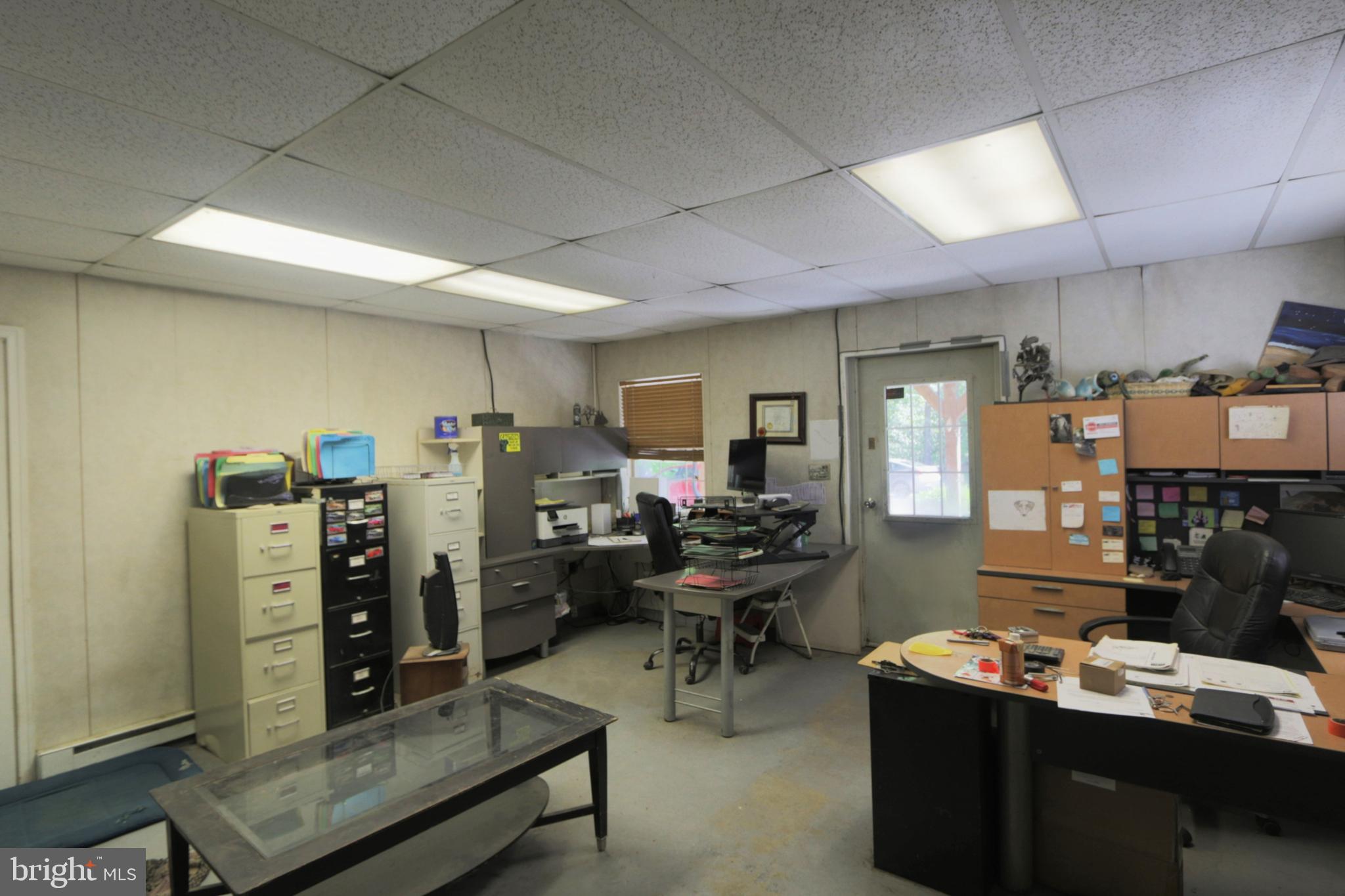 41 Wood Landing Road Fredericksburg, VA 22405 - Photo 77 of 79 a room with lots of furniture and clutter