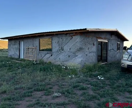 a view of a backyard with plants