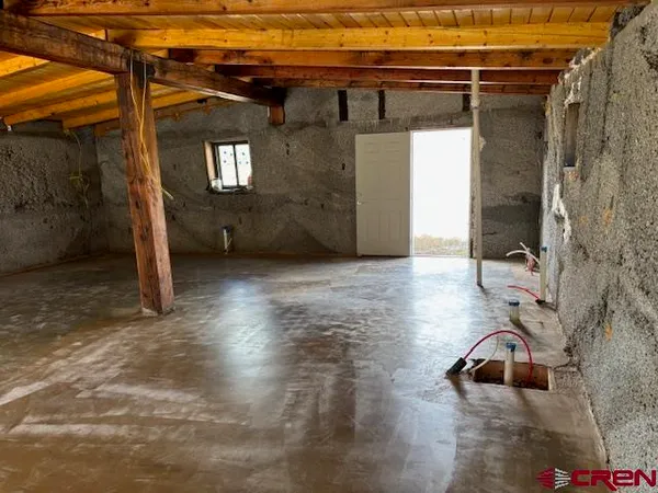 a view of a porch with wooden floor