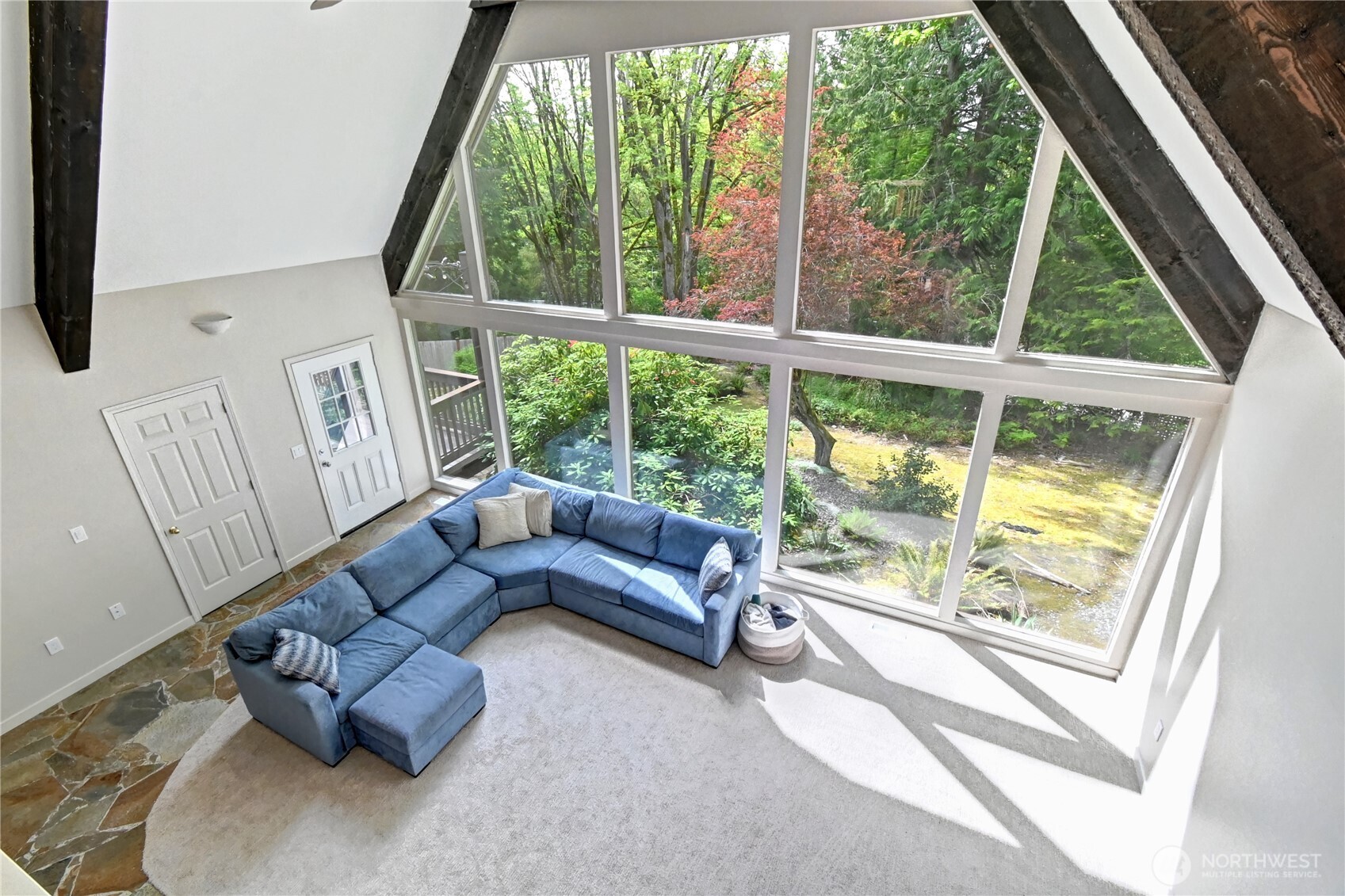 28539 Northeast Tolt Hill Road Carnation, WA 98014 - Photo 13 of 36 a living room with furniture and a large window
