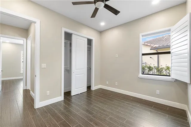 a utility room with mirror sink and washer dryer