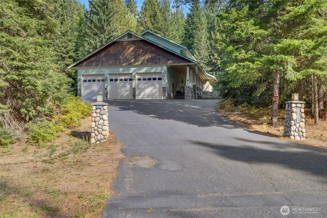 a view of a lush green hillside and a mountain