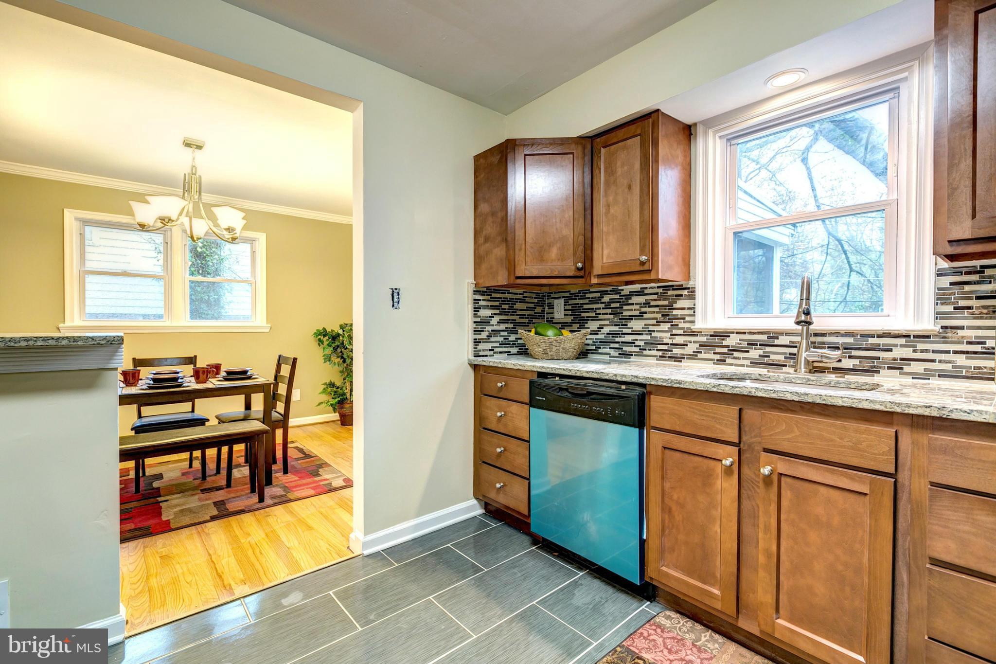 6708 Glenkirk Road Baltimore, MD 21239 - Photo 11 of 30 Beautiful Cabinets And Tile Back Splash