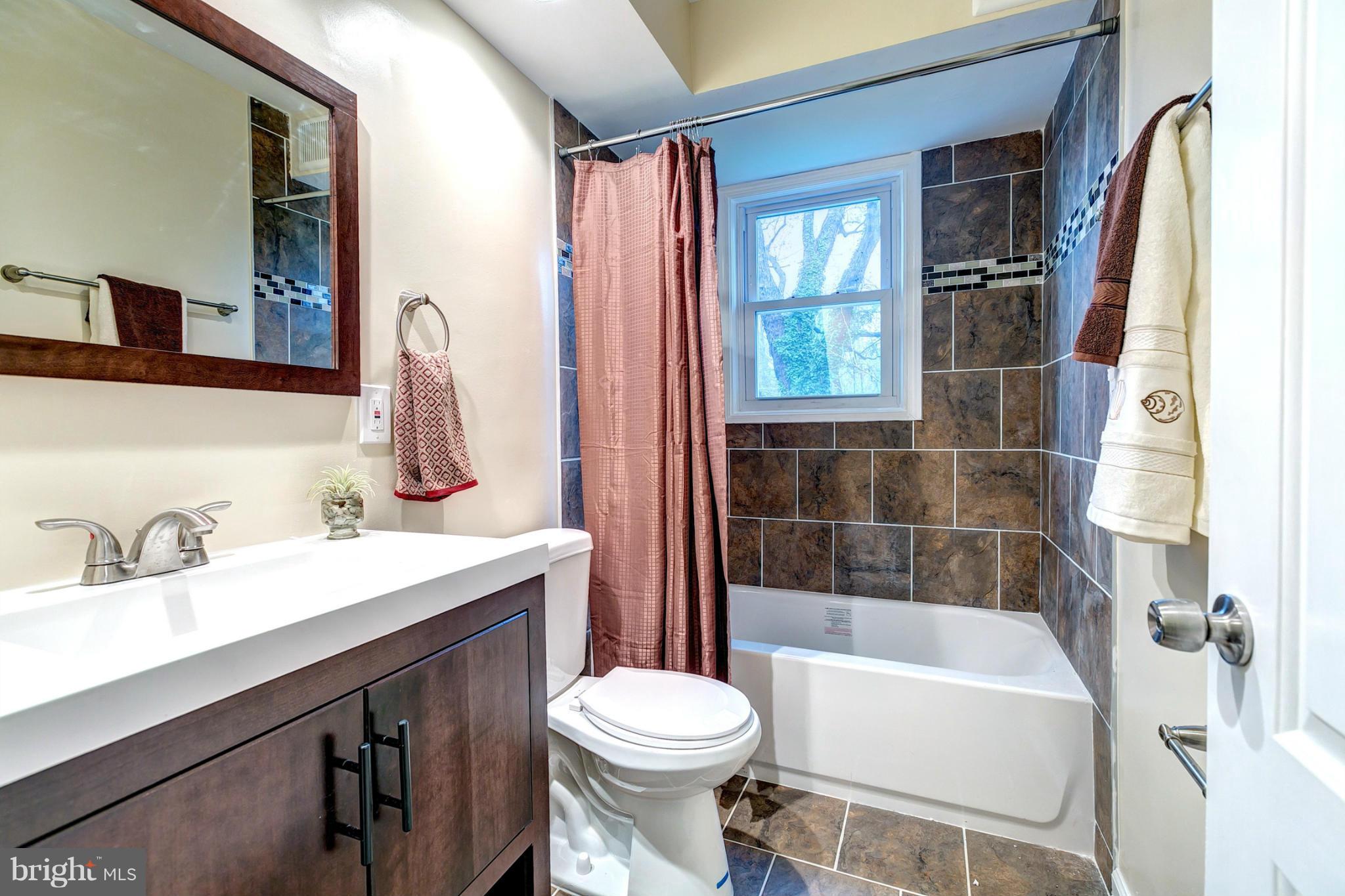 6708 Glenkirk Road Baltimore, MD 21239 - Photo 19 of 30 Stunning Tile In Main Bathroom