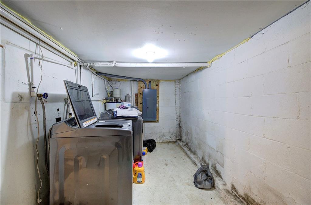 105 Mary Street Rome, GA 30161 - Photo 13 of 15 a utility room with dryer and washer