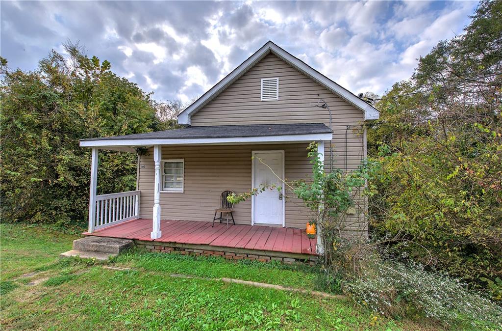 105 Mary Street Rome, GA 30161 - Photo 2 of 15 a view of a house with a yard porch and sitting area