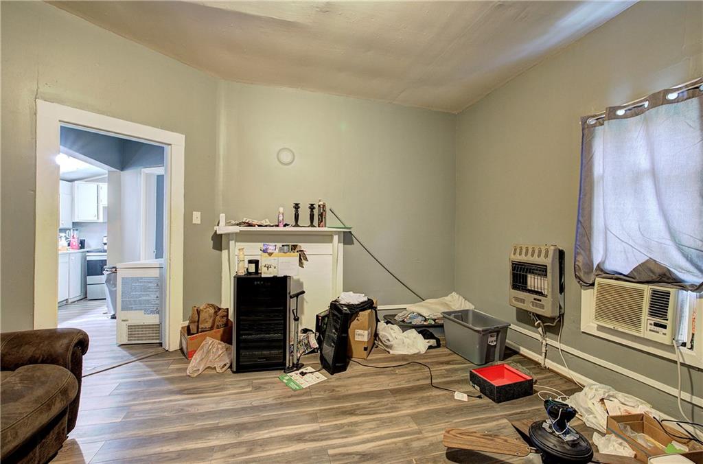 105 Mary Street Rome, GA 30161 - Photo 5 of 15 a view of a livingroom with furniture and fireplace