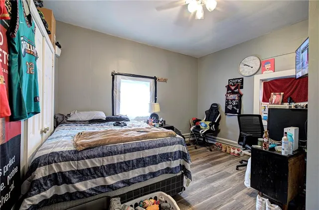 a bathroom with a sink toilet and a mirror