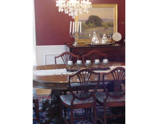 12 Beech Tree Farm Road Scituate, MA 02066 - Photo 12 of 24 a view of a dining room with furniture and chandelier