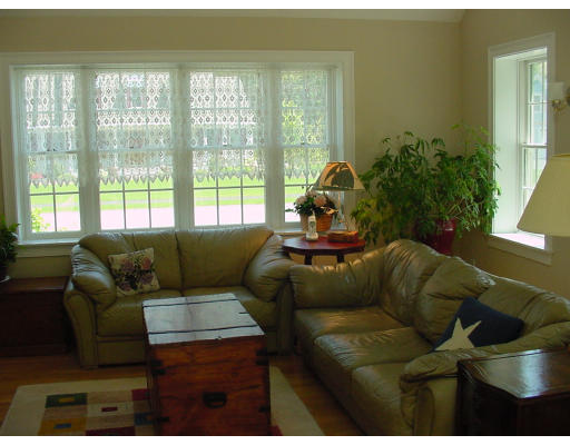 12 Beech Tree Farm Road Scituate, MA 02066 - Photo 15 of 24 a living room with furniture and a large window