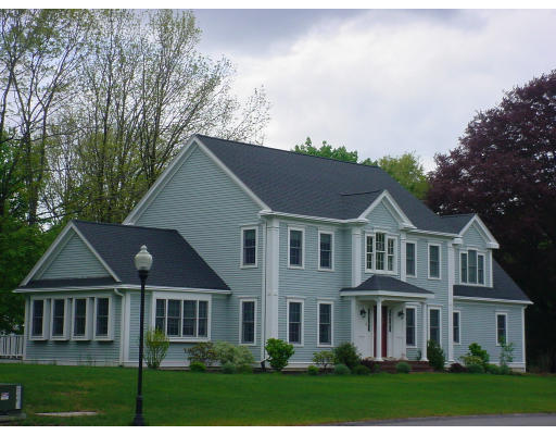 12 Beech Tree Farm Road Scituate, MA 02066 - Photo 2 of 24 front view of a house with a yard