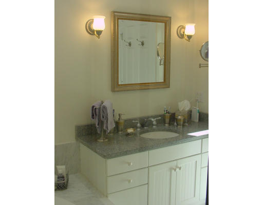 12 Beech Tree Farm Road Scituate, MA 02066 - Photo 23 of 24 a bathroom with a sink and a mirror