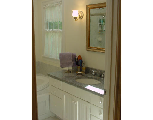 12 Beech Tree Farm Road Scituate, MA 02066 - Photo 24 of 24 a bathroom with a granite countertop sink and a mirror