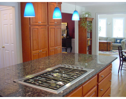 12 Beech Tree Farm Road Scituate, MA 02066 - Photo 8 of 24 a kitchen view of a kitchen island a stove a refrigerator and a dining table