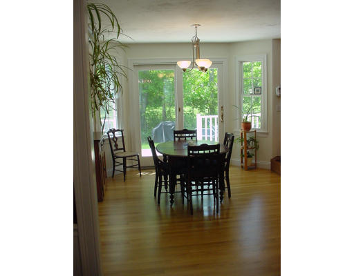 12 Beech Tree Farm Road Scituate, MA 02066 - Photo 10 of 24 a view of a dining room with furniture and chandelier