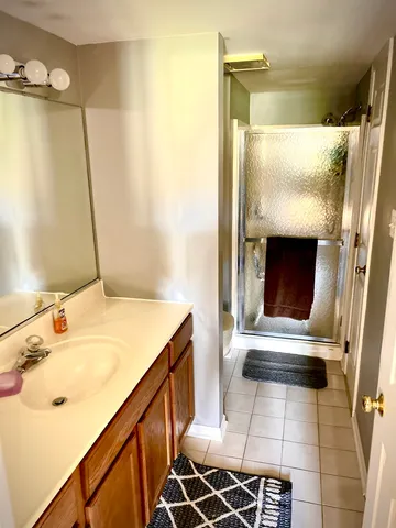 a view of walk in closet with window