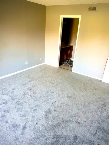 a view of room with window and a yard