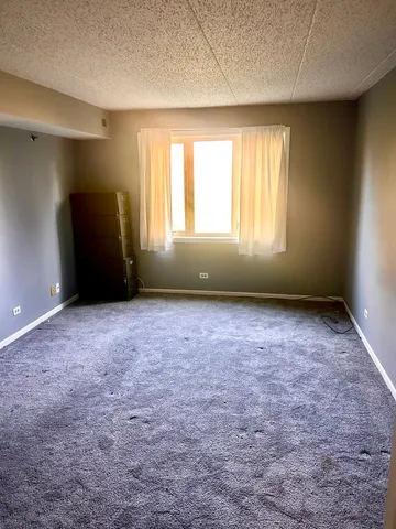 a view of a bathroom with tub and shower