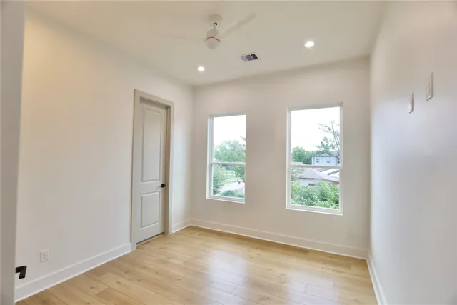 a bathroom with a shower and a toilet