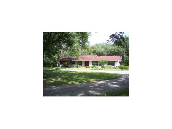 3880 Lakemont Road Melbourne, FL 32934 - Photo 1 of 8 a view of house with backyard
