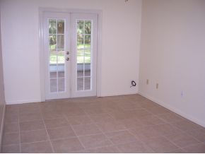 3880 Lakemont Road Melbourne, FL 32934 - Photo 7 of 8 a view of an empty room with a window