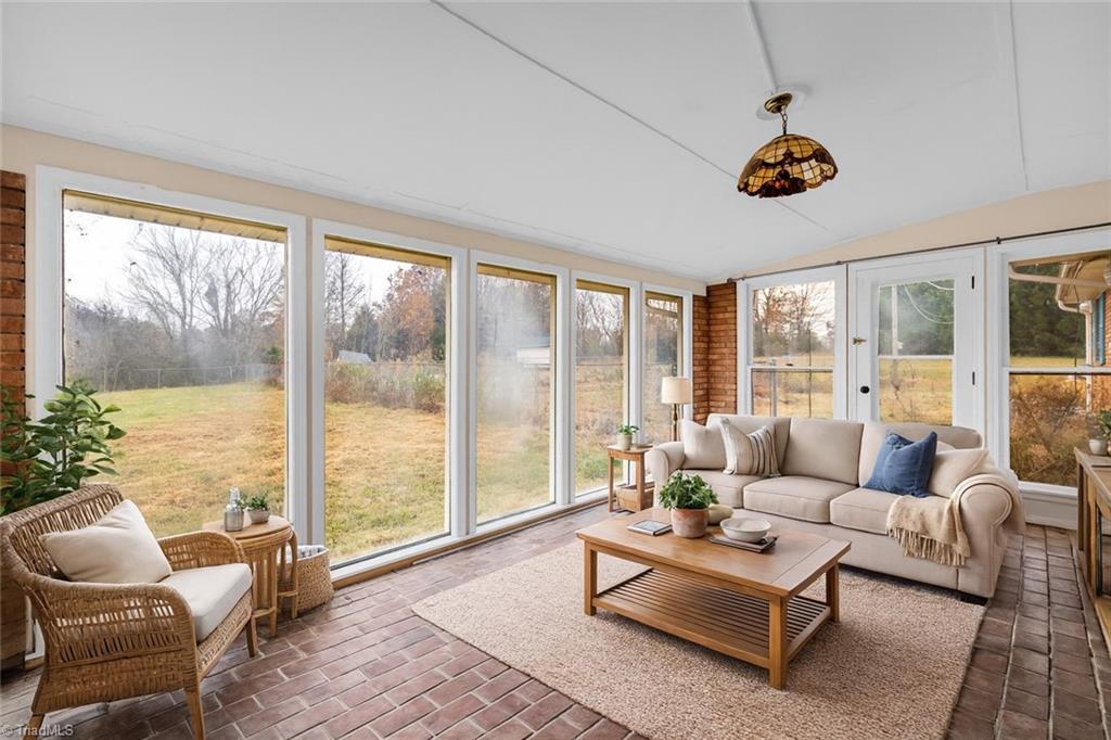 871 Gold Hill Road Madison, NC 27025 - Photo 19 of 38 Sunroom Staged