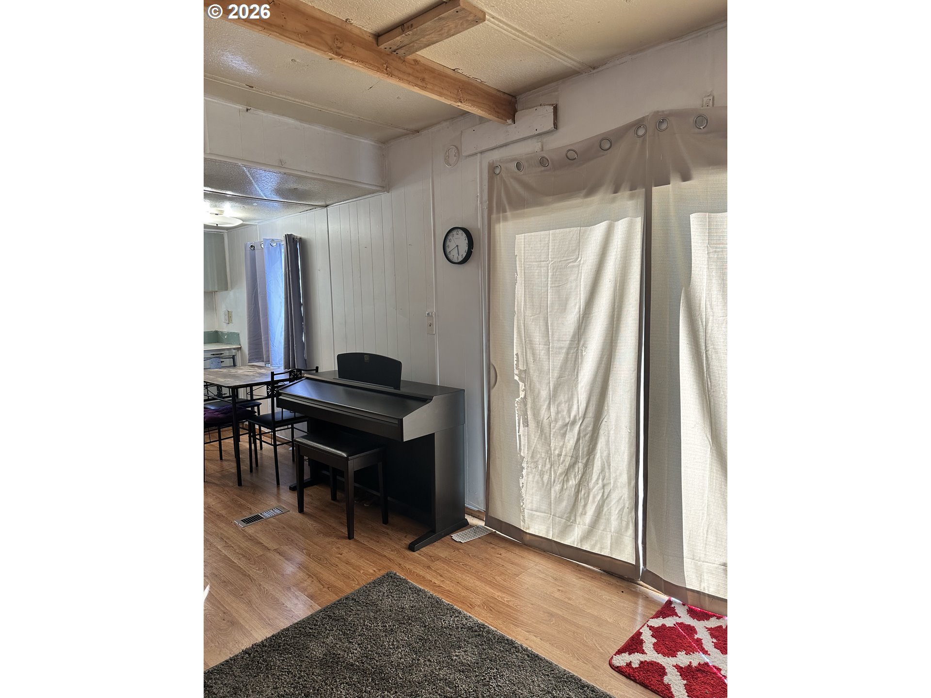 37635 Row River Road, Unit 7 Dorena, OR 97434 - Photo 10 of 27 a living room with a table and a window