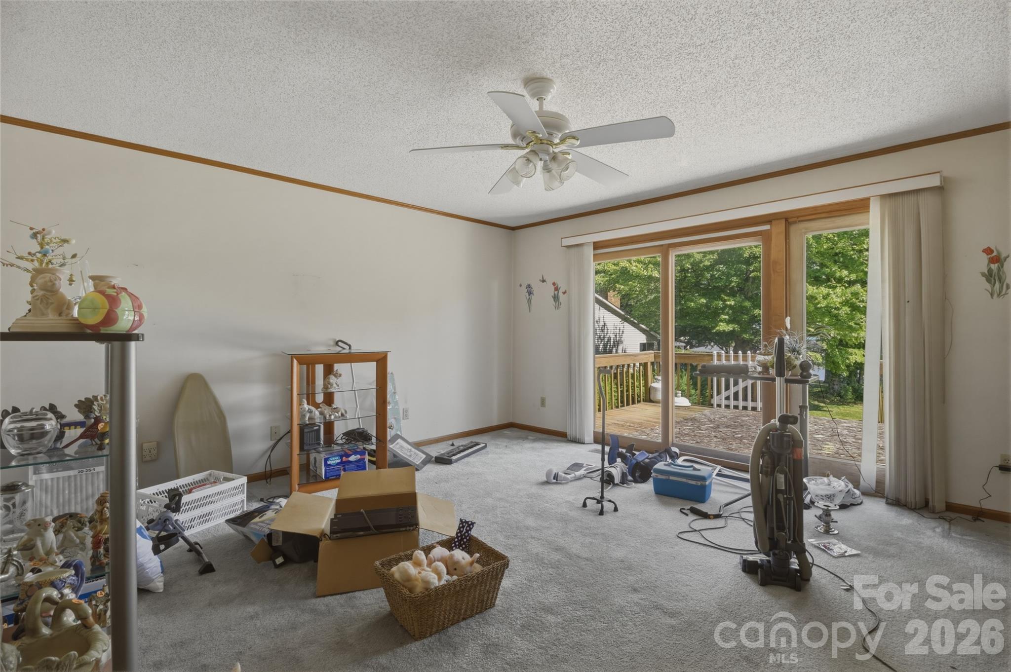 8226 Normandy Road Denver, NC 28037 - Photo 25 of 29 a living room with furniture and a window