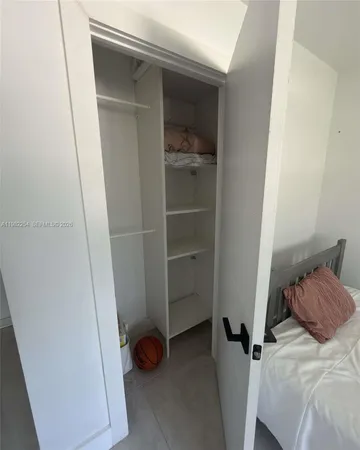 a bathroom with a sink and a shower