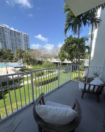 a view of a two chair in the balcony