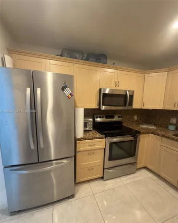 a bed room with a bed and a window