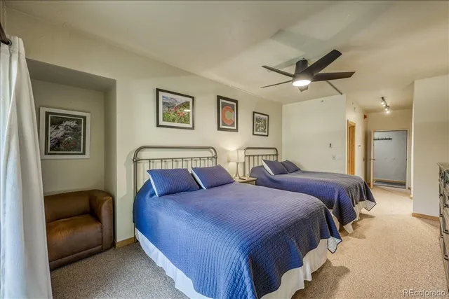 a room with wooden floor and furniture