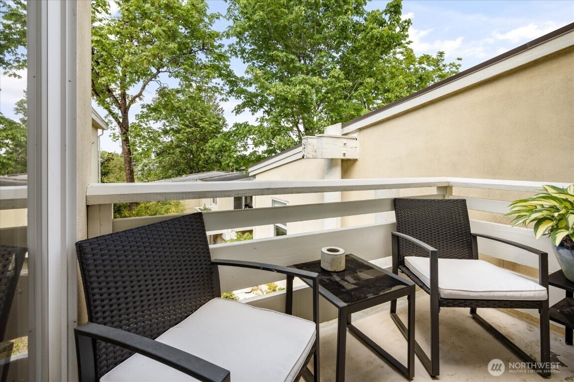 1724 26th Avenue Seattle, WA 98122 - Photo 14 of 28 a view of a chairs and table in the balcony