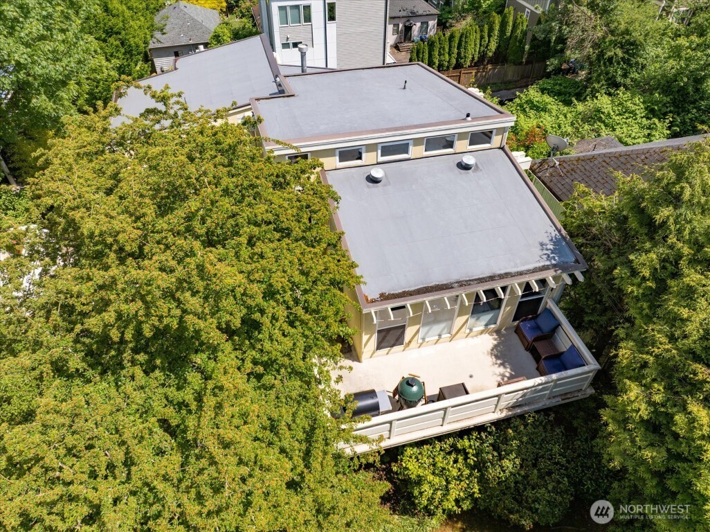 1724 26th Avenue Seattle, WA 98122 - Photo 26 of 28 an aerial view of a house with a yard