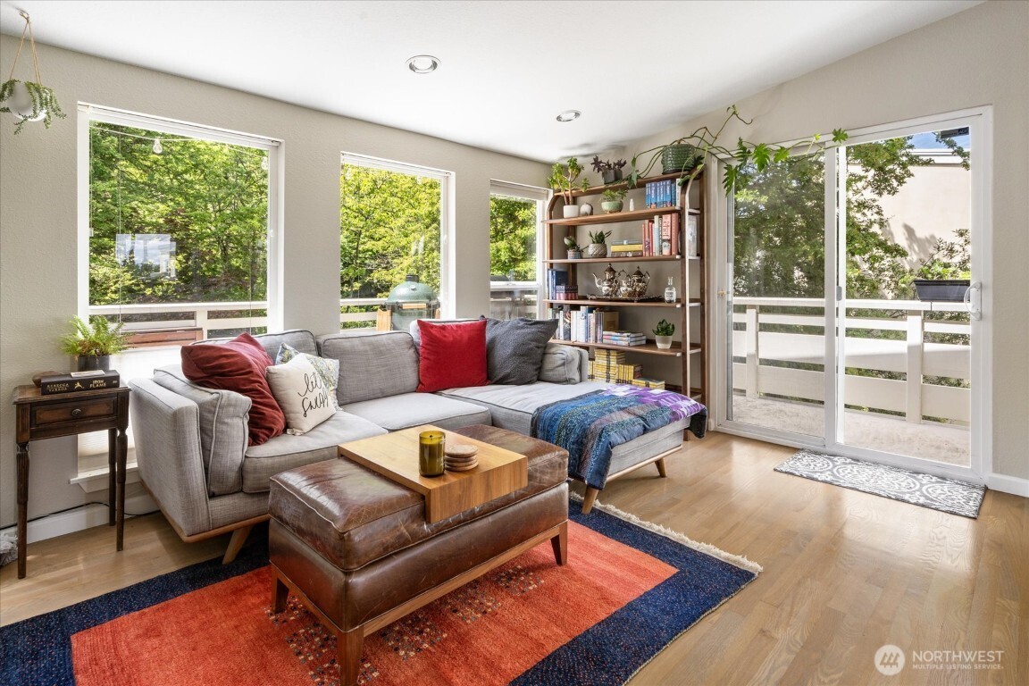 1724 26th Avenue Seattle, WA 98122 - Photo 7 of 28 a living room with furniture and a large window