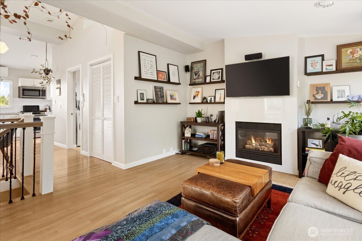 1724 26th Avenue Seattle, WA 98122 - Photo 8 of 28 a living room with furniture fireplace and flat screen tv